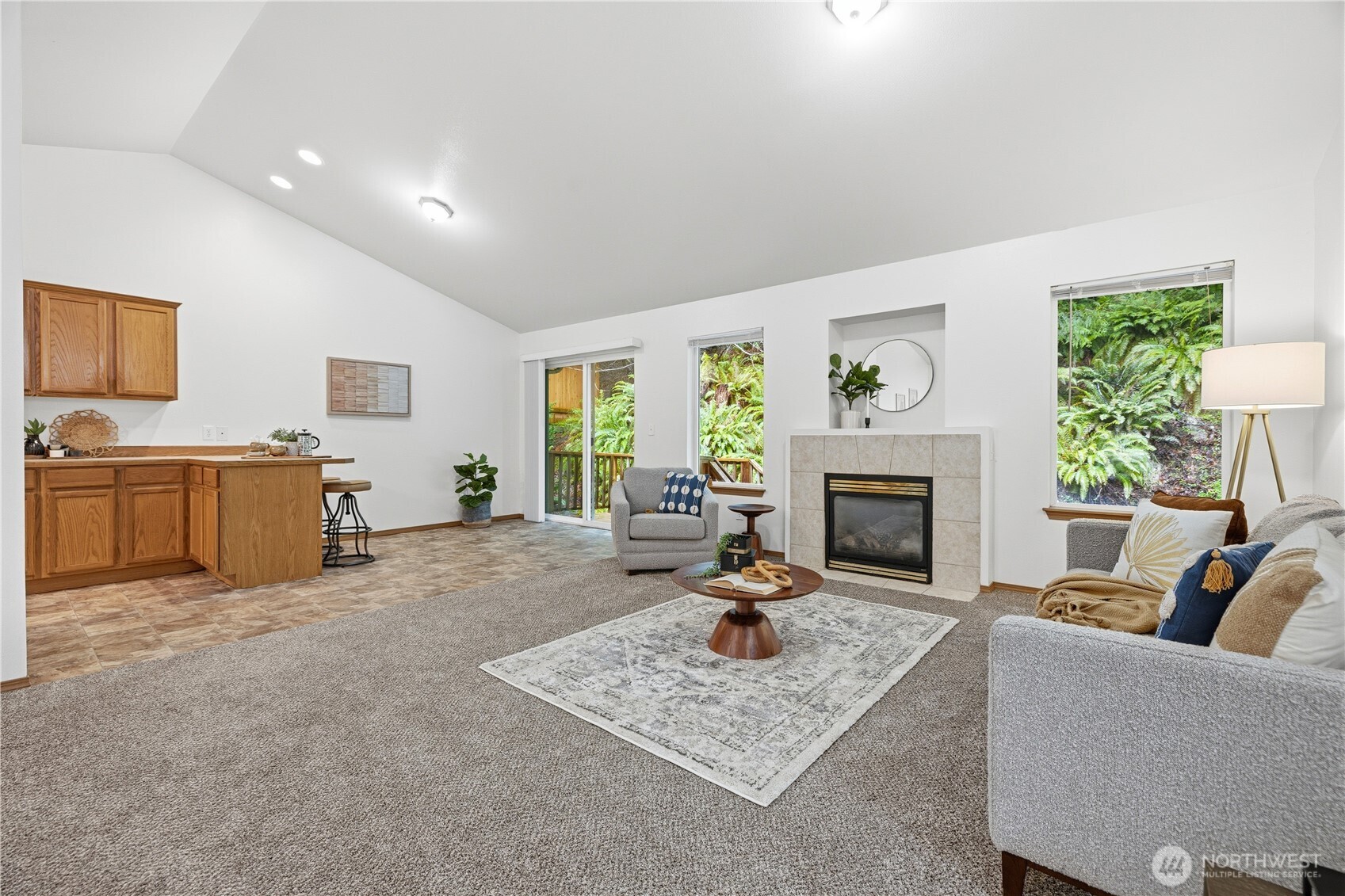 39 Sudden Valley Drive Bellingham, WA 98229 - Photo 4 of 40 a living room with furniture a fireplace and a table
