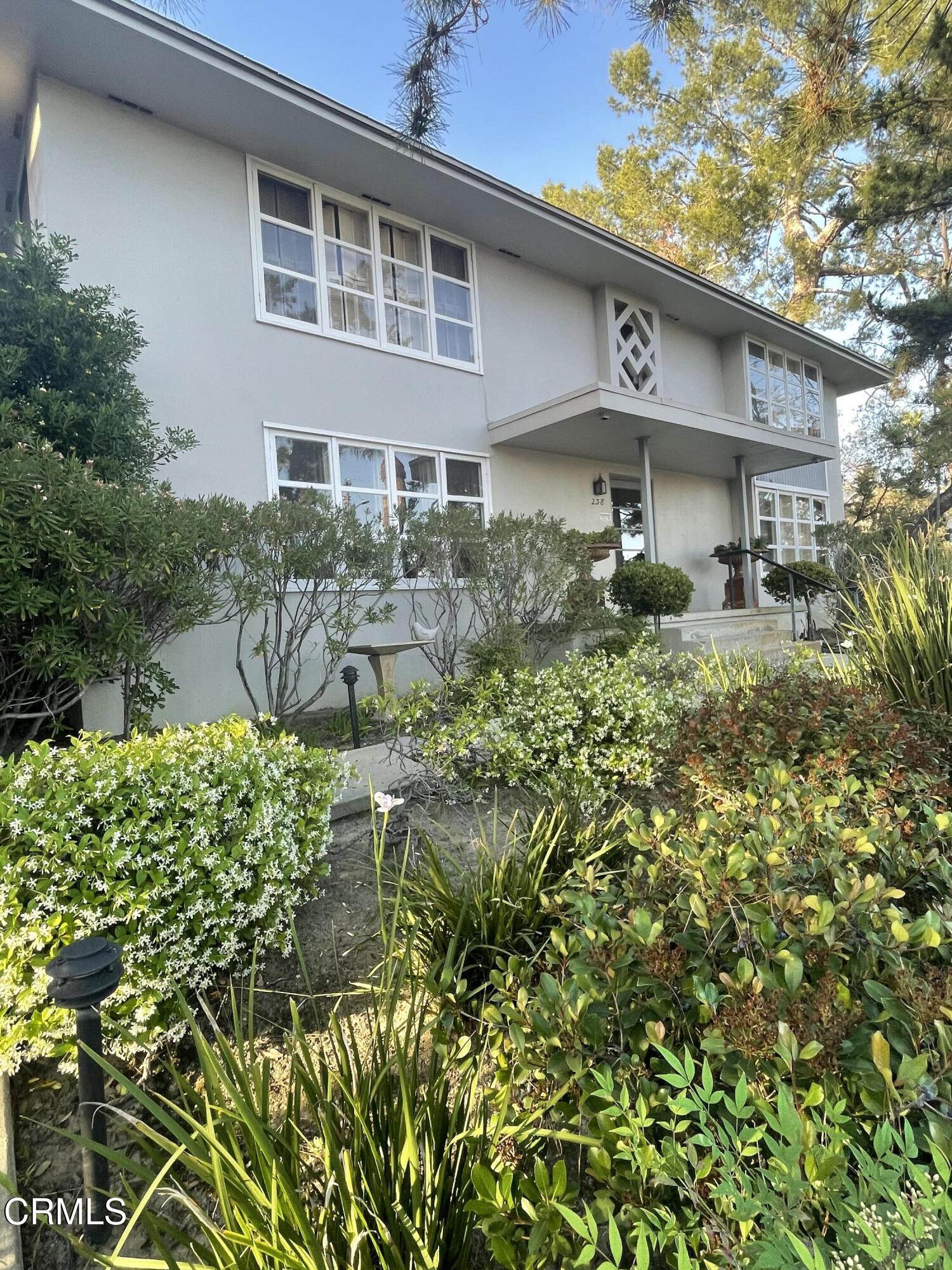 238 Mockingbird Lane South Pasadena, CA 91030 - Photo 2 of 18 a view of a house with a yard and plants