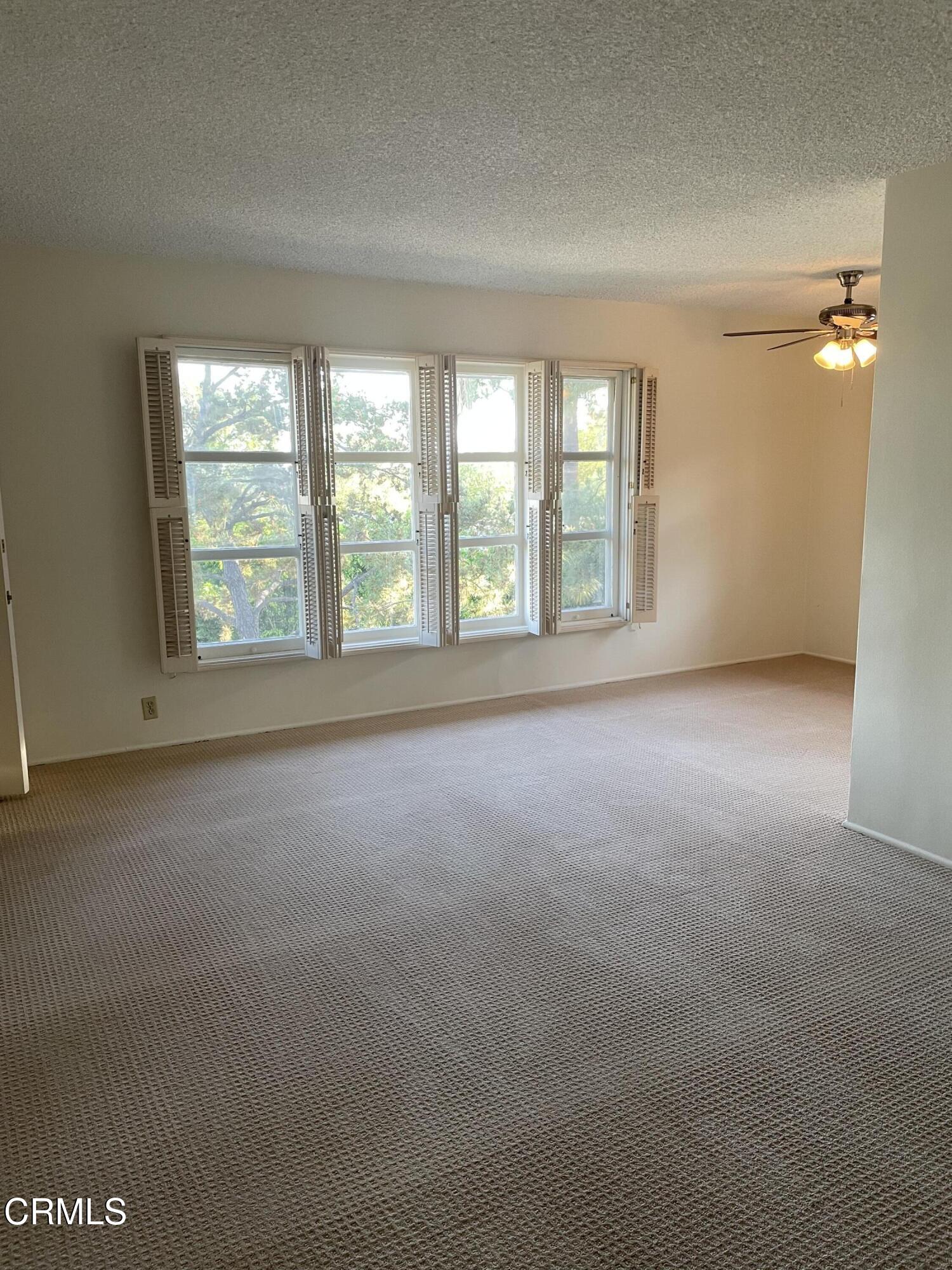 238 Mockingbird Lane South Pasadena, CA 91030 - Photo 6 of 18 an empty room with windows