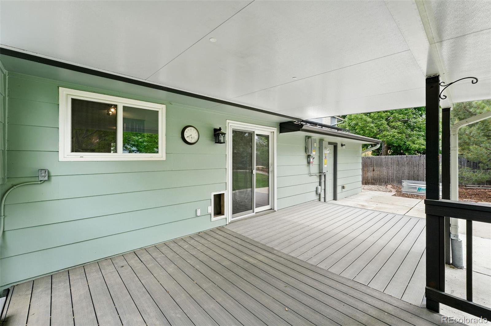9315 Field Lane Westminster, CO 80021 - Photo 29 of 50 a view of a house with a porch