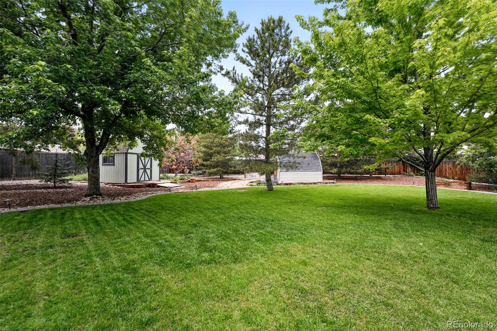 9315 Field Lane Westminster, CO 80021 - Photo 33 of 50 a view of a park with large trees