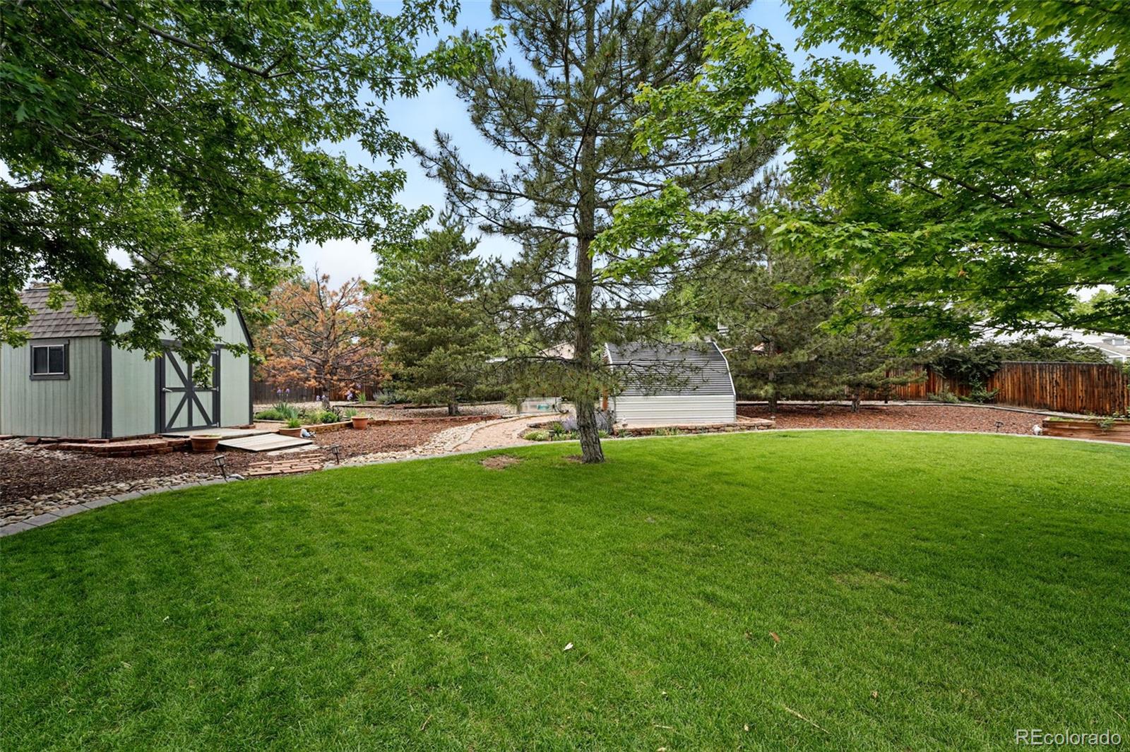9315 Field Lane Westminster, CO 80021 - Photo 34 of 50 a view of a park with a tree