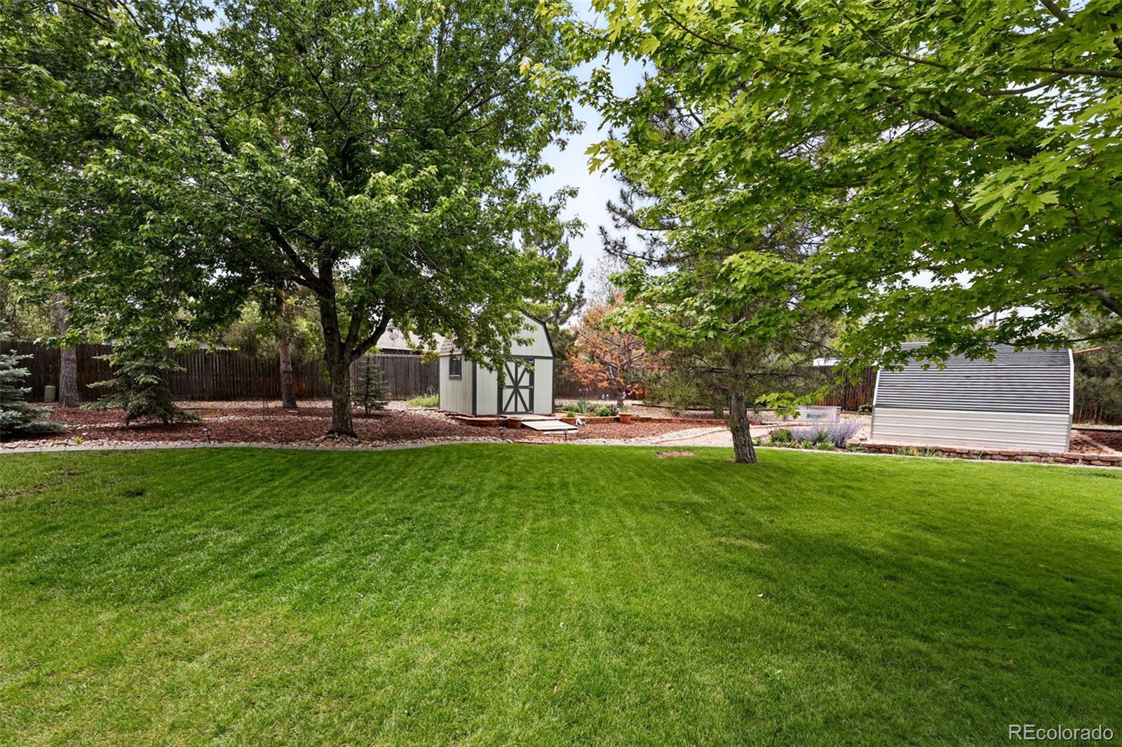 9315 Field Lane Westminster, CO 80021 - Photo 35 of 50 a huge green field with lots of trees