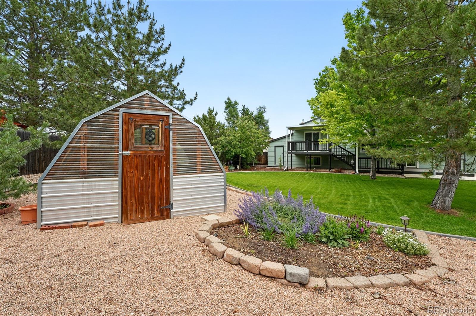 9315 Field Lane Westminster, CO 80021 - Photo 39 of 50 a view of a house with a yard