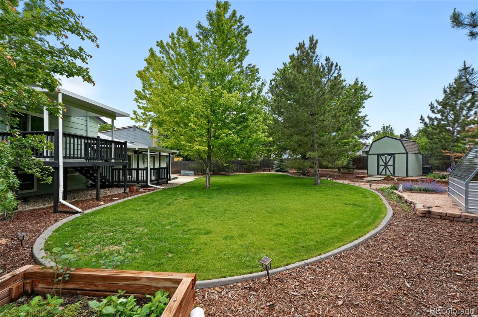 9315 Field Lane Westminster, CO 80021 - Photo 43 of 50 a view of a garden
