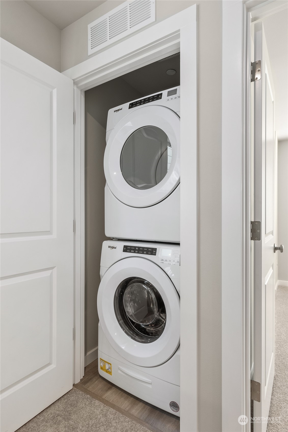 23413 Edmonds Way, Unit E1 Edmonds, WA 98026 - Photo 25 of 27 a utility room with dryer and washer