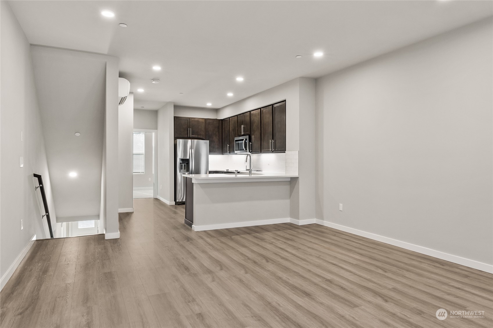 23413 Edmonds Way, Unit E1 Edmonds, WA 98026 - Photo 5 of 27 a view of kitchen with sink and refrigerator