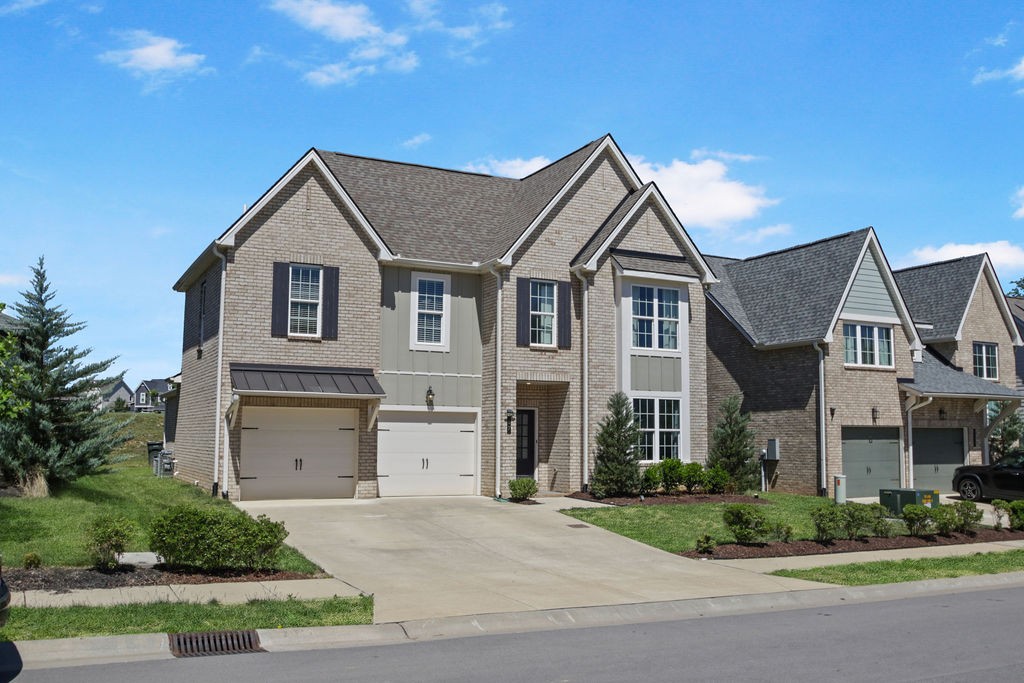 917 Plowson Road Mount Juliet, TN 37122 - Photo 1 of 47 front view of house with a yard