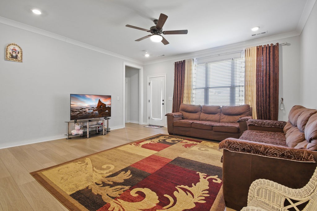 917 Plowson Road Mount Juliet, TN 37122 - Photo 14 of 47 a living room with furniture and a flat screen tv