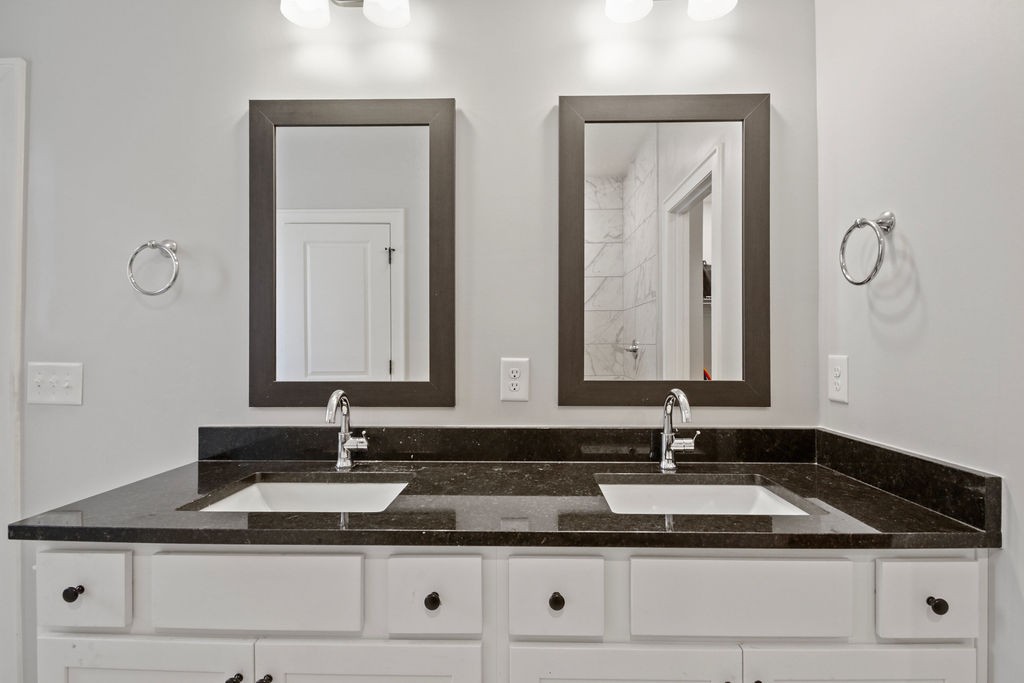 917 Plowson Road Mount Juliet, TN 37122 - Photo 19 of 47 a bathroom with double sink and a mirror