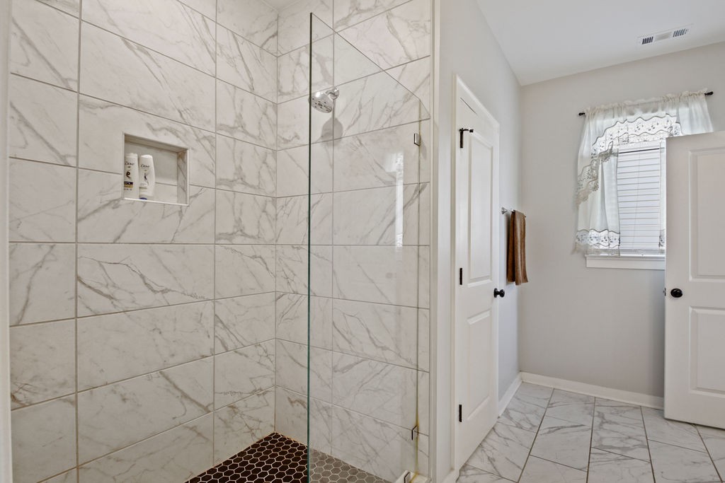 917 Plowson Road Mount Juliet, TN 37122 - Photo 20 of 47 a bathroom with a shower