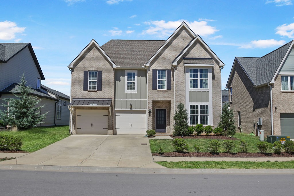 917 Plowson Road Mount Juliet, TN 37122 - Photo 2 of 47 front view of house with a yard