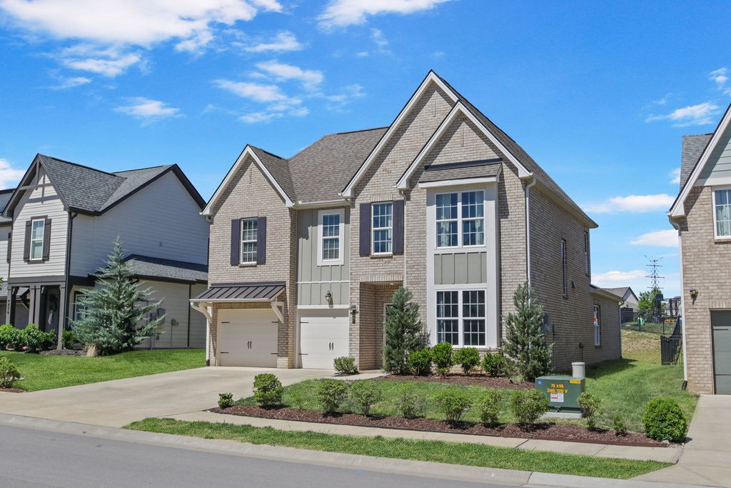 917 Plowson Road Mount Juliet, TN 37122 - Photo 3 of 47 a front view of a house with a yard