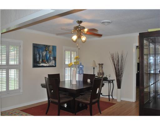 311 Doddridge Street Corpus Christi, TX 78411 - Photo 3 of 8 a dining room with furniture and window