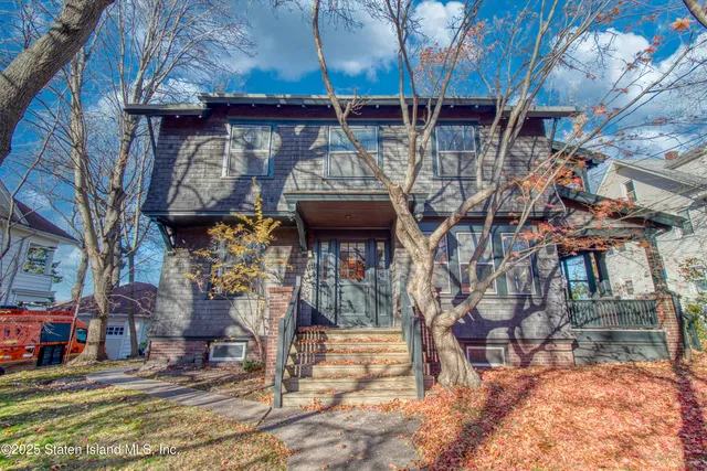 a view of a chairs and table in the patio