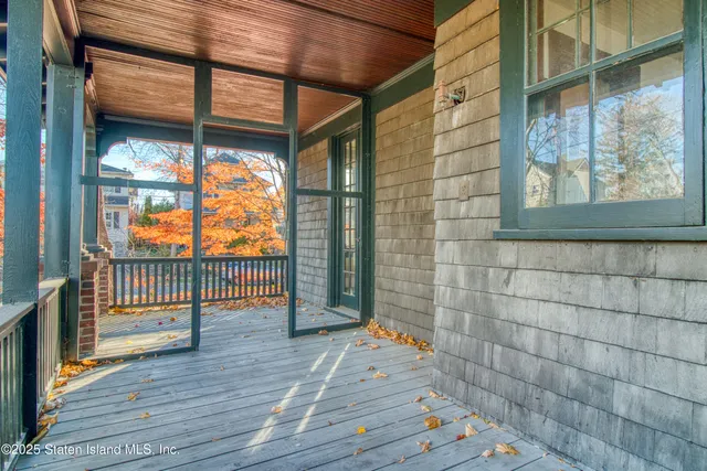 a view of a hallway with a chandelier