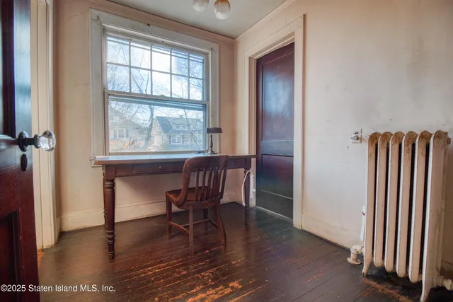a view of pool with sitting area