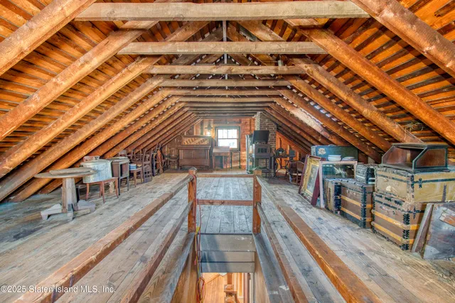 a view of water heater room with wooden roof