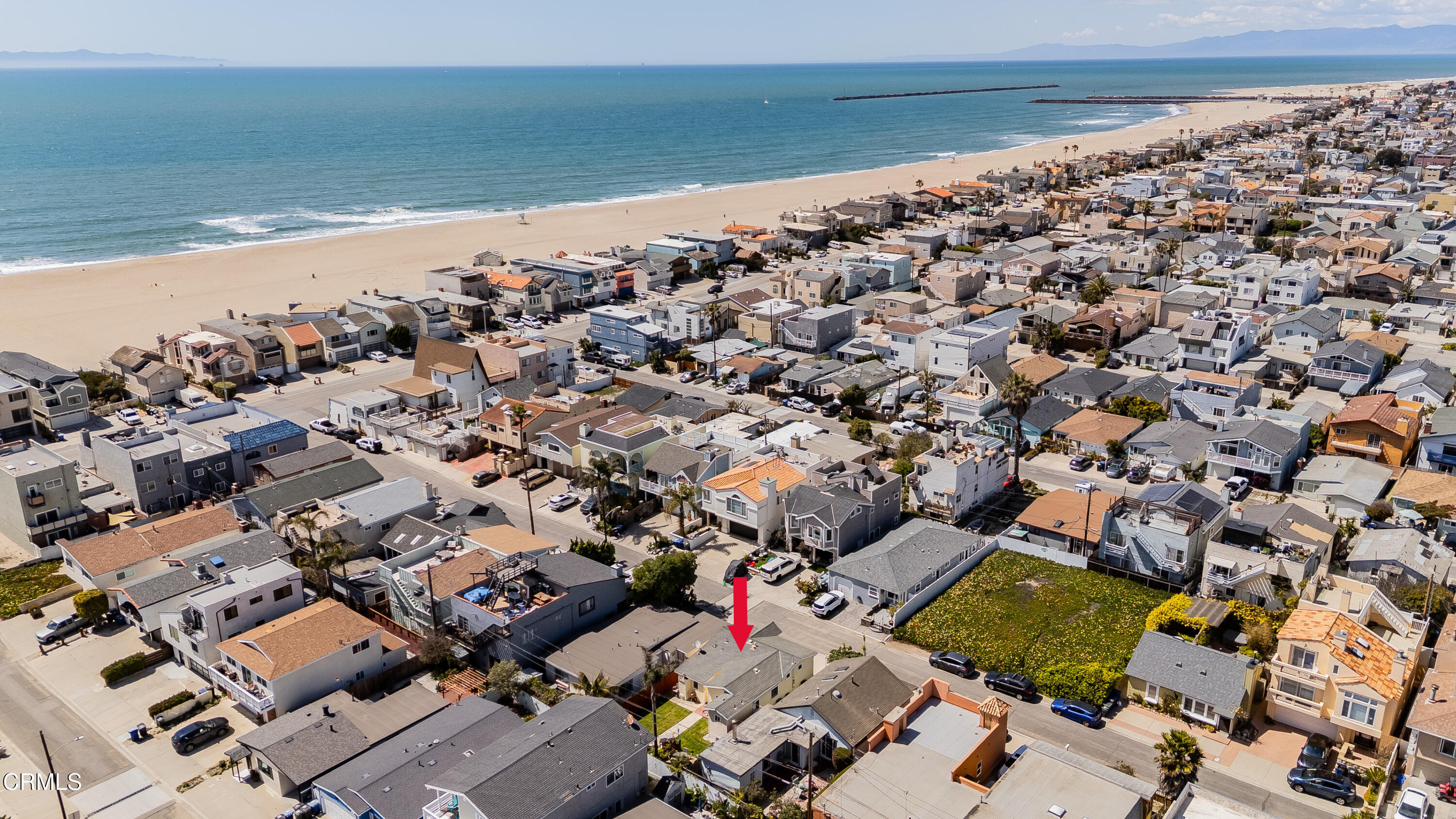 136 Los Angeles Avenue Oxnard, CA 93035 - Photo 2 of 3 an aerial view of a ocean beach