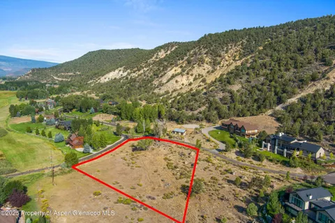 a view of a mountain from a balcony