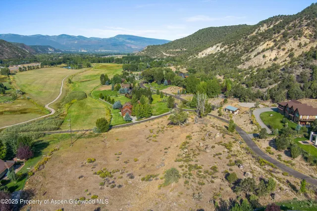 a view of a mountain with an outdoor space