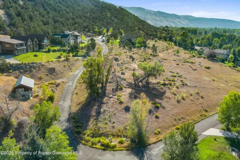 an aerial view of residential house with outdoor space