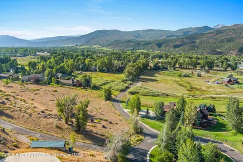 a view of a swimming pool with a mountain