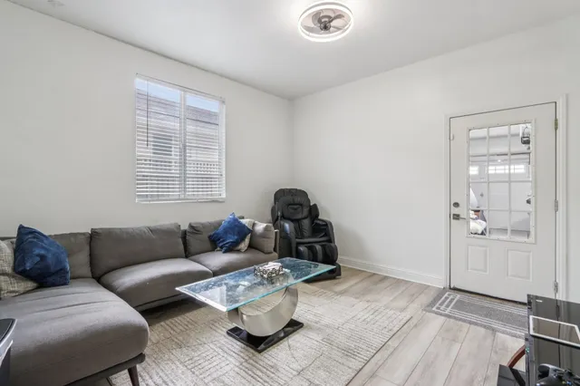 a white toilet sitting next to a bathroom sink