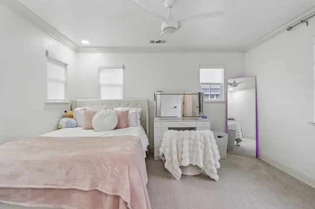 a bathroom with a granite countertop sink mirror and a bathtub
