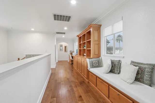 a view of a porch with furniture and yard