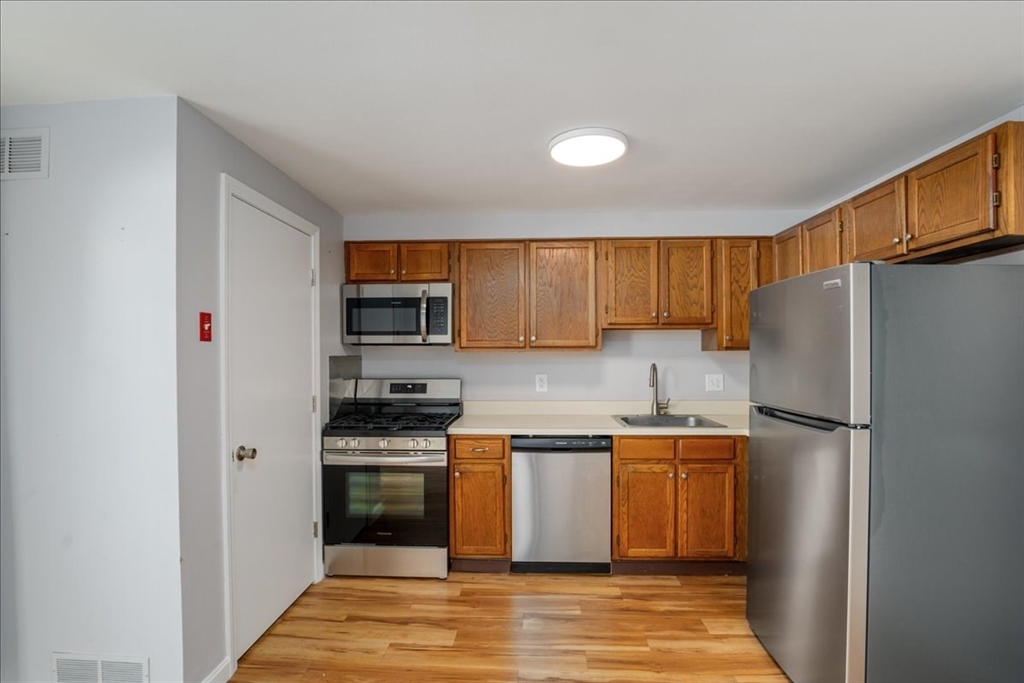 74 Roper Street, Unit C Lowell, MA 01852 - Photo 9 of 26 Gallery Image 9