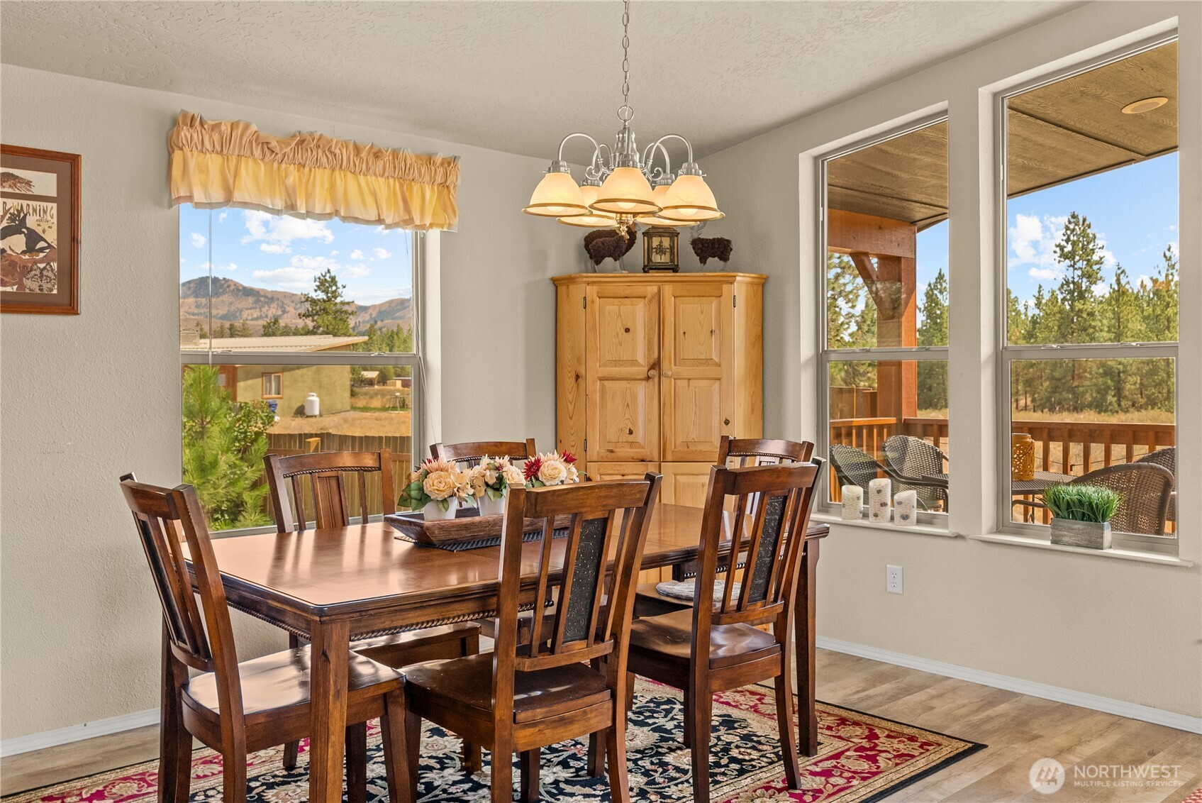 88 Horizon View Winthrop, WA 98862 - Photo 20 of 40 a view of a dining room with furniture large windows and wooden floor