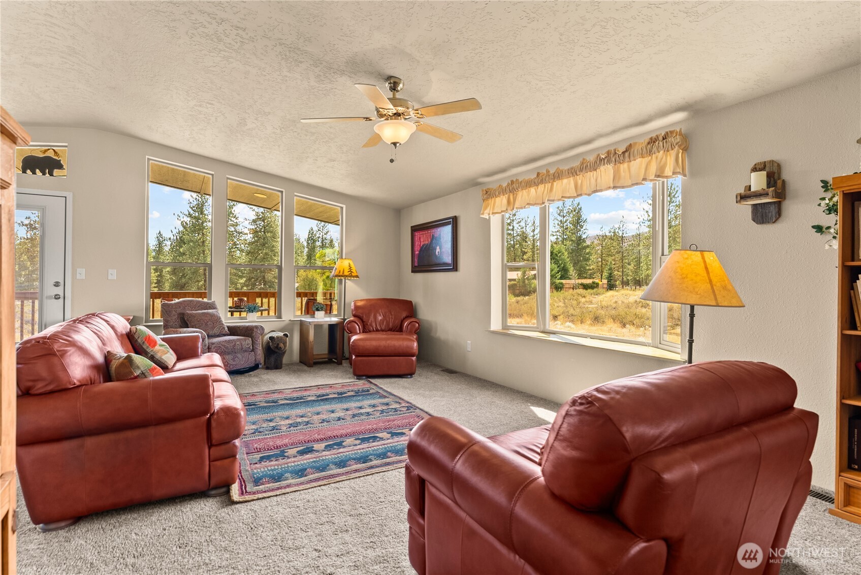 88 Horizon View Winthrop, WA 98862 - Photo 23 of 40 a living room with furniture and a large window