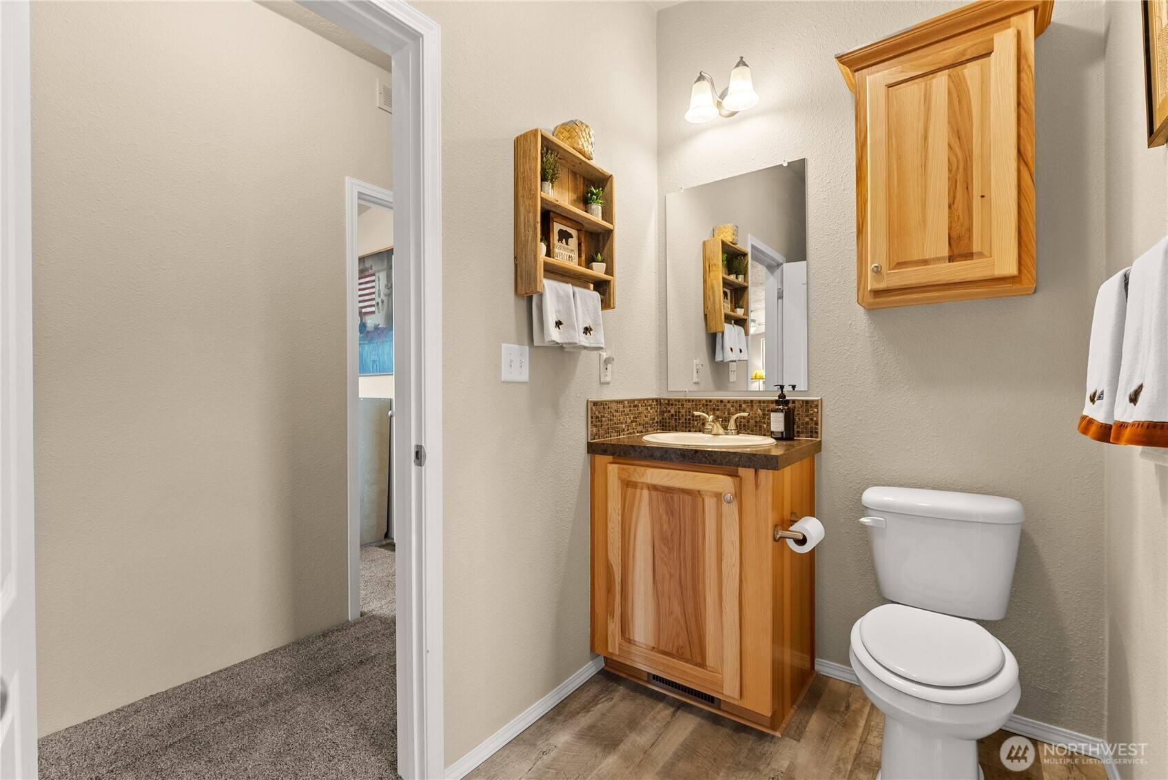 88 Horizon View Winthrop, WA 98862 - Photo 33 of 40 a bathroom with a toilet sink and mirror