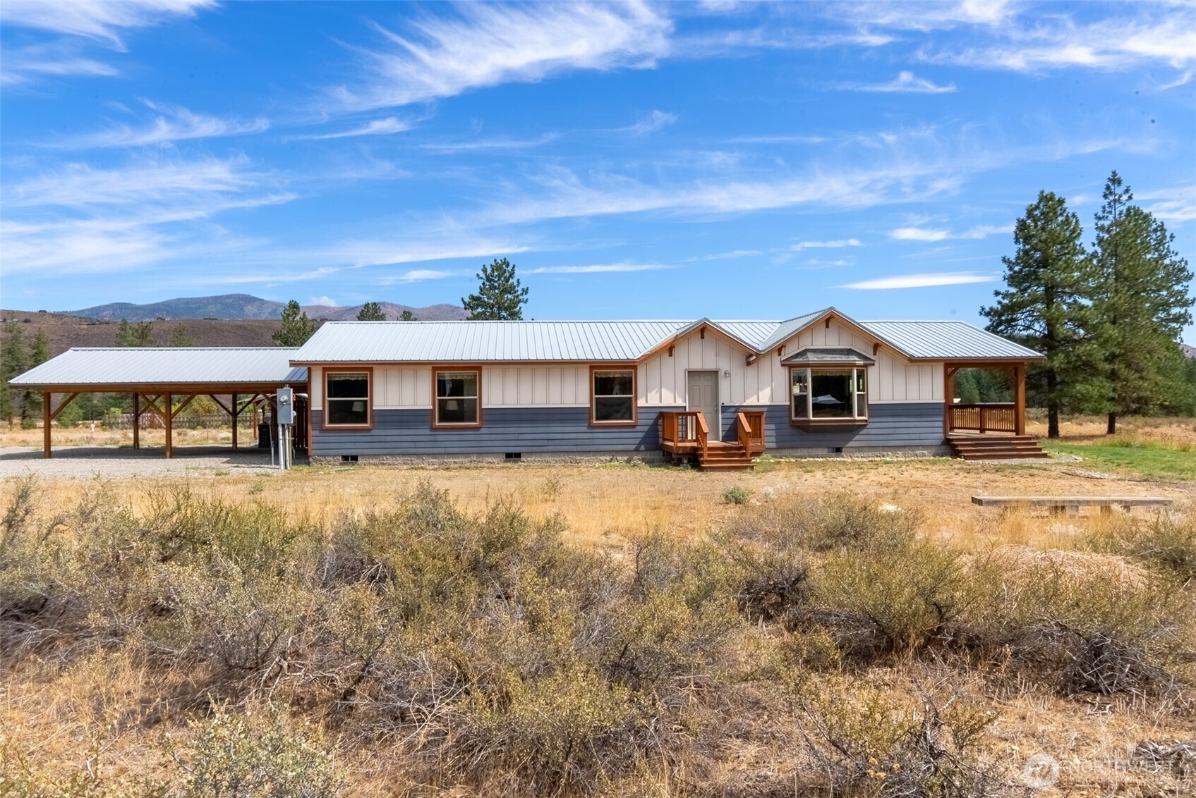 88 Horizon View Winthrop, WA 98862 - Photo 7 of 40 a front view of a house with a yard