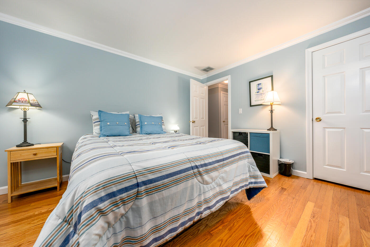 41 Joyce Anne Road Centerville, MA 02632 - Photo 14 of 33 a bedroom with a bed and a lamp