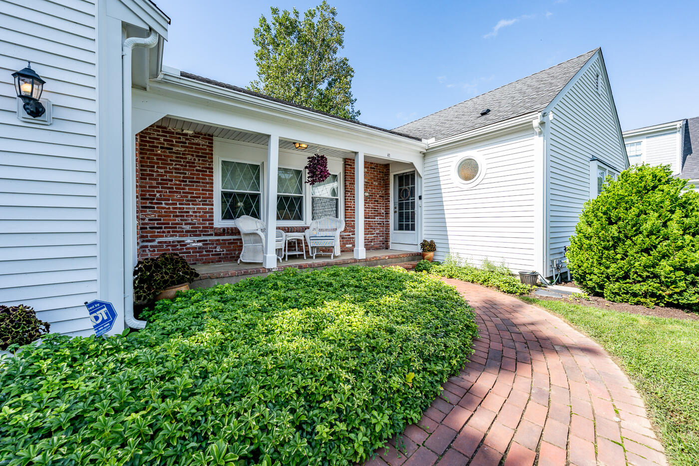 41 Joyce Anne Road Centerville, MA 02632 - Photo 26 of 33 a front view of a house with garden