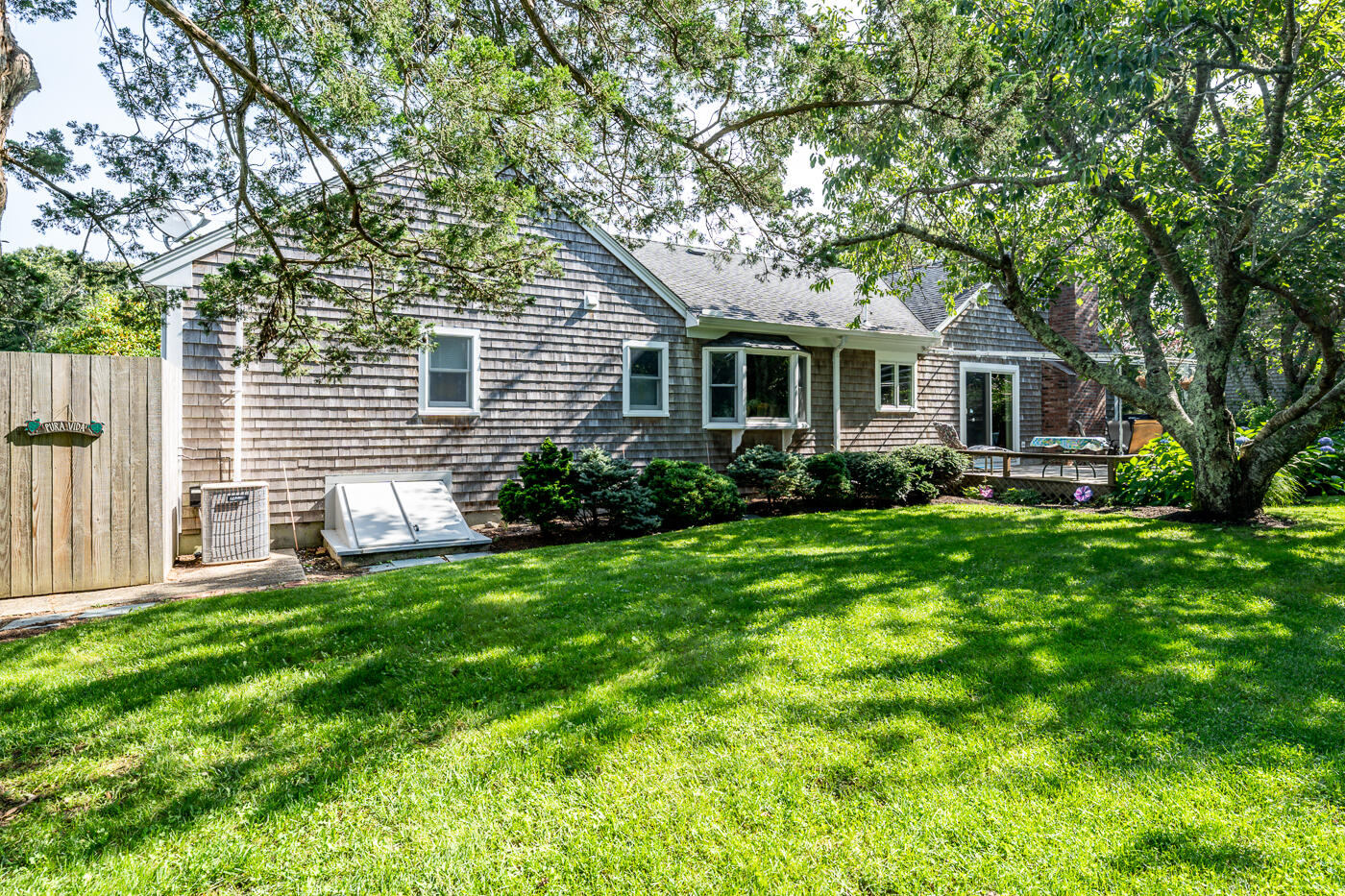41 Joyce Anne Road Centerville, MA 02632 - Photo 28 of 33 a front view of house with yard and green space