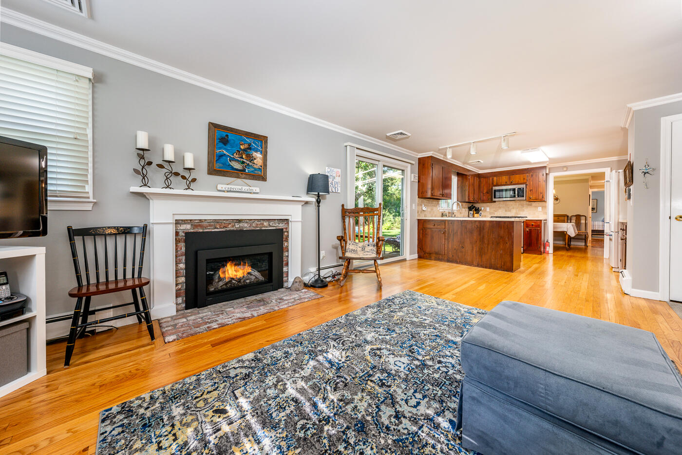 41 Joyce Anne Road Centerville, MA 02632 - Photo 3 of 33 a living room with furniture and a fireplace