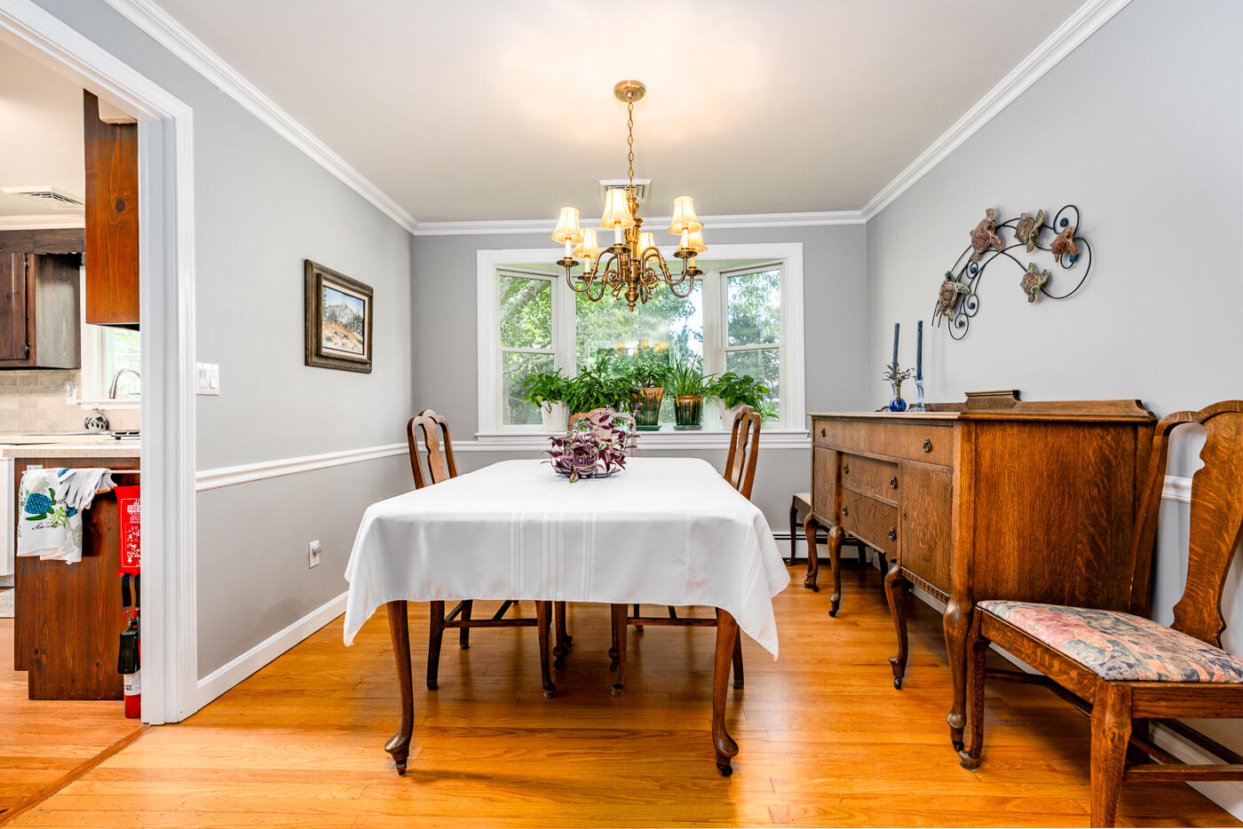 41 Joyce Anne Road Centerville, MA 02632 - Photo 10 of 33 a view of a dining room with furniture window and wooden floor
