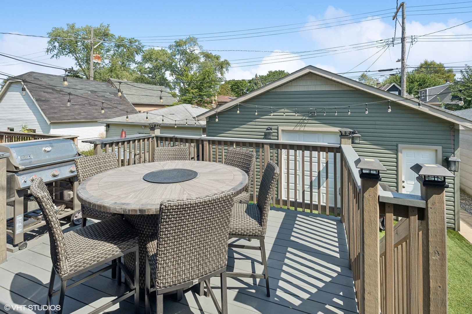 2949 North Rutherford Avenue Chicago, IL 60634 - Photo 16 of 23 a view of a patio with table and chairs with wooden floor and fence