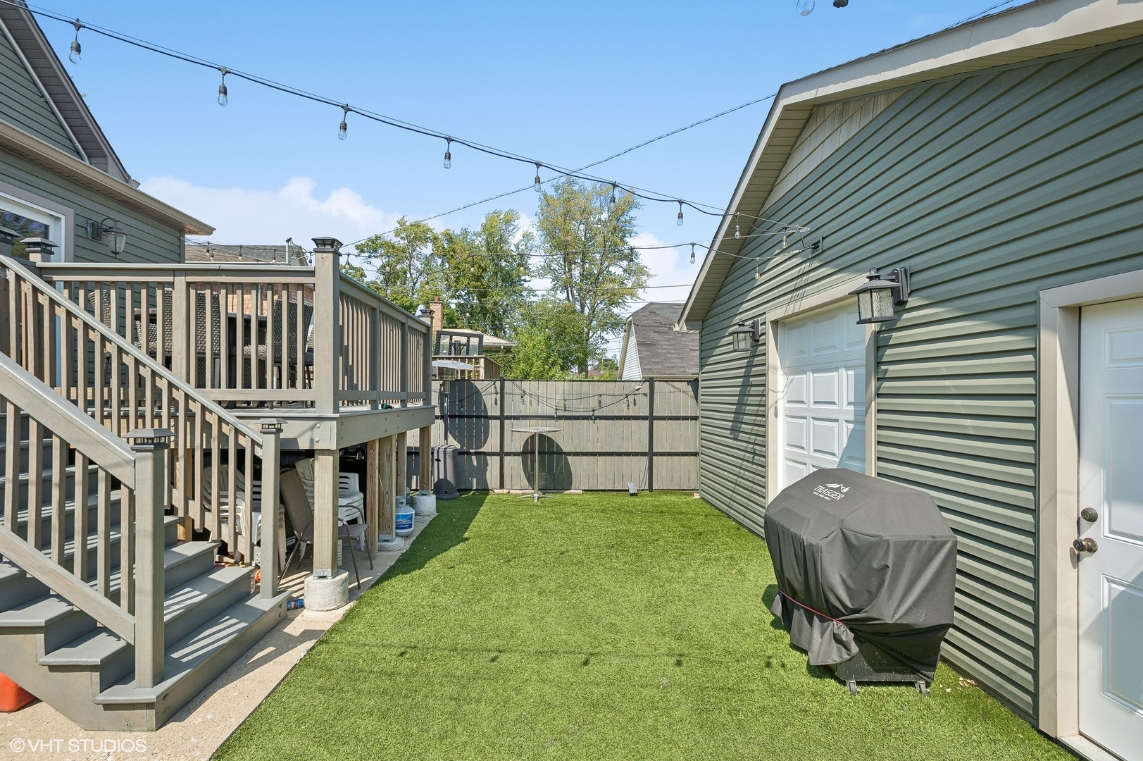 2949 North Rutherford Avenue Chicago, IL 60634 - Photo 18 of 23 a view of a chair and tables in the backyard
