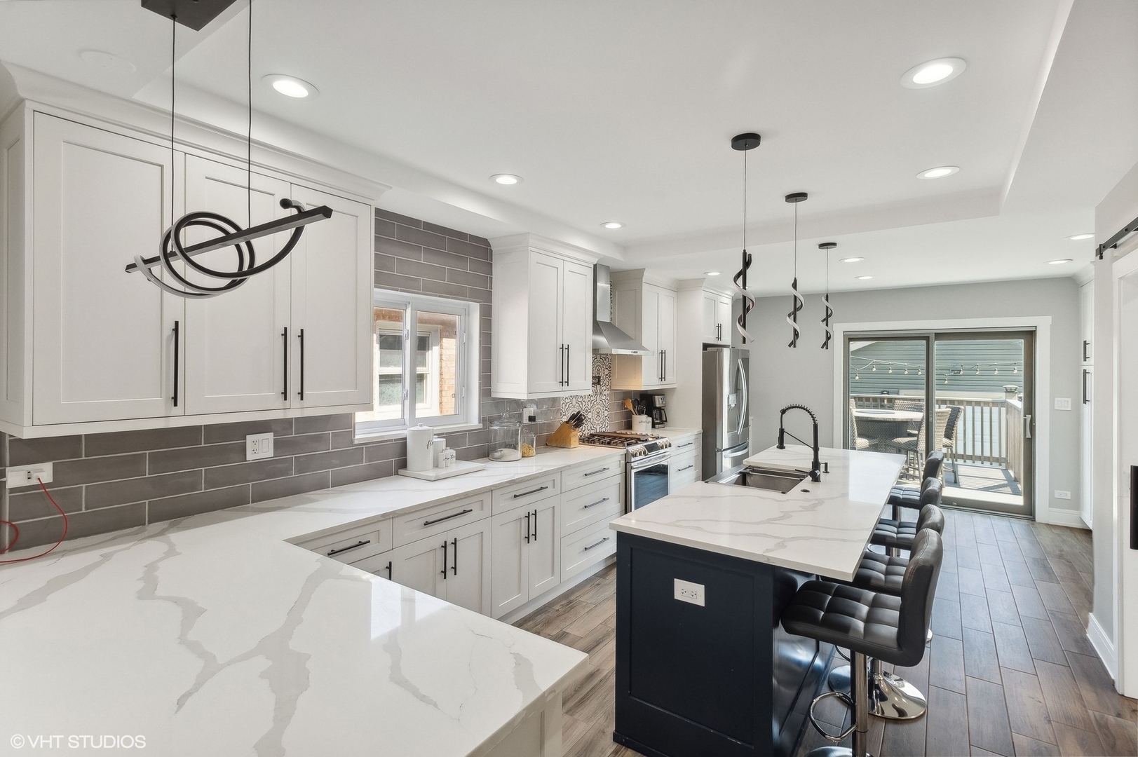 2949 North Rutherford Avenue Chicago, IL 60634 - Photo 3 of 23 a large kitchen with a table and chairs