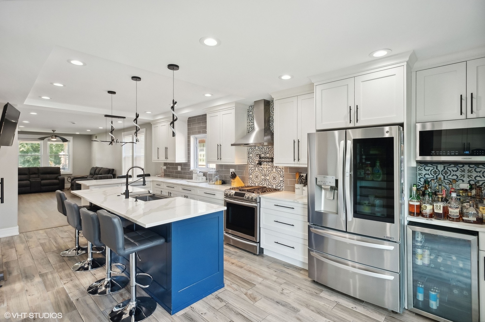 2949 North Rutherford Avenue Chicago, IL 60634 - Photo 4 of 23 a kitchen with kitchen island a sink stove and refrigerator