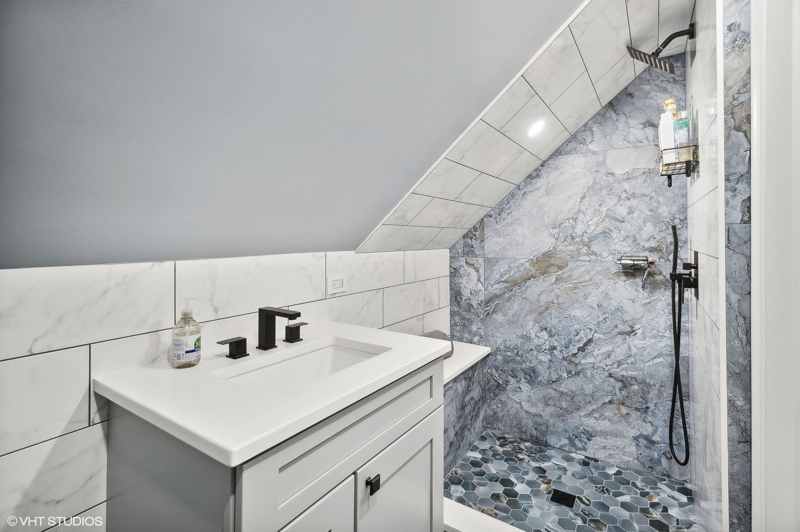 2949 North Rutherford Avenue Chicago, IL 60634 - Photo 6 of 23 a bathroom with a sink and a shower