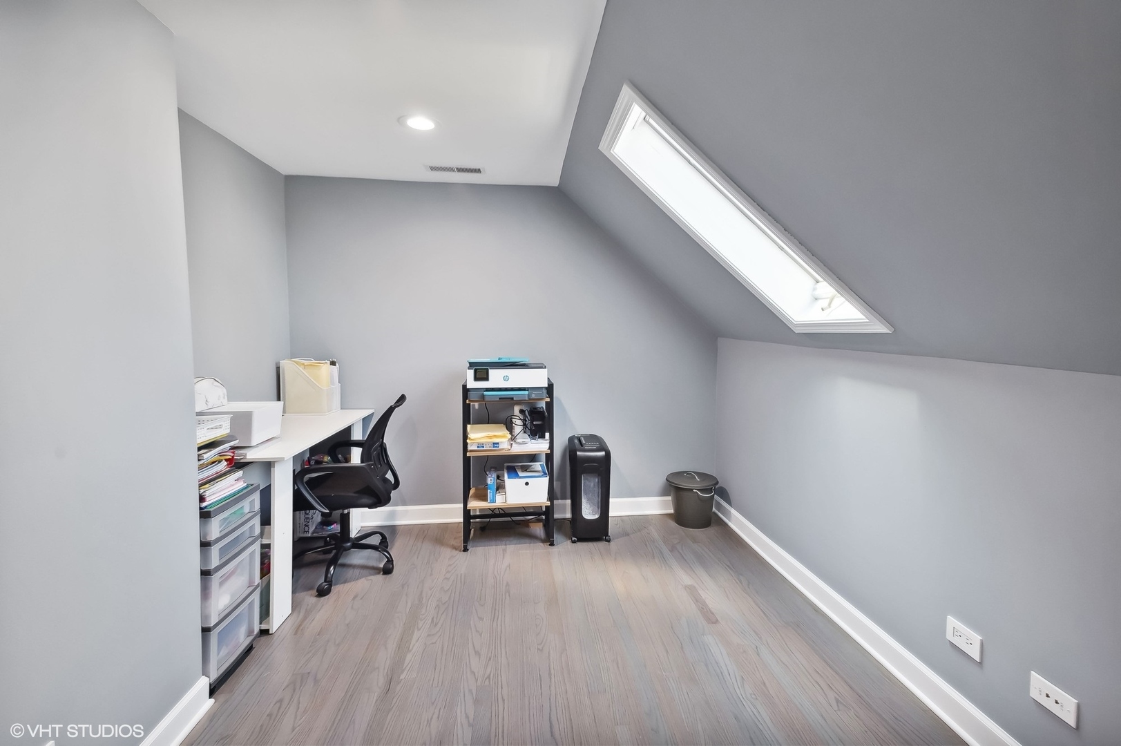 2949 North Rutherford Avenue Chicago, IL 60634 - Photo 7 of 23 a view of a workspace with furniture and a workspace