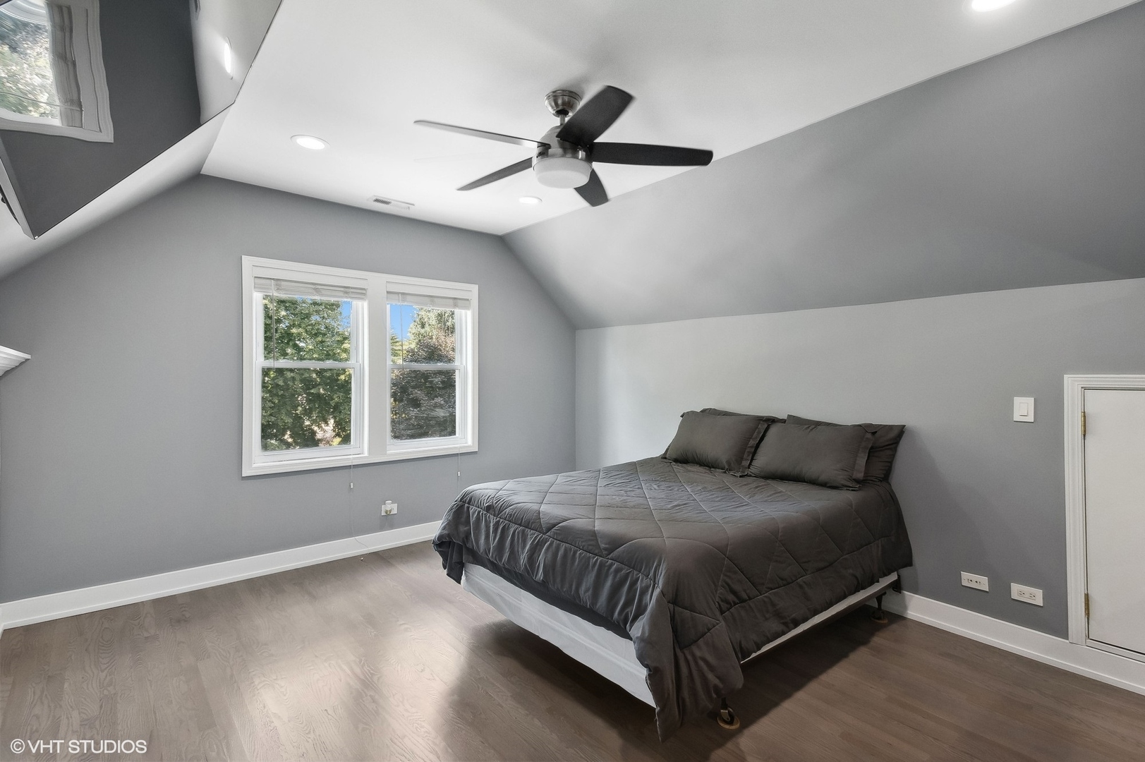 2949 North Rutherford Avenue Chicago, IL 60634 - Photo 8 of 23 a bedroom with a bed and window