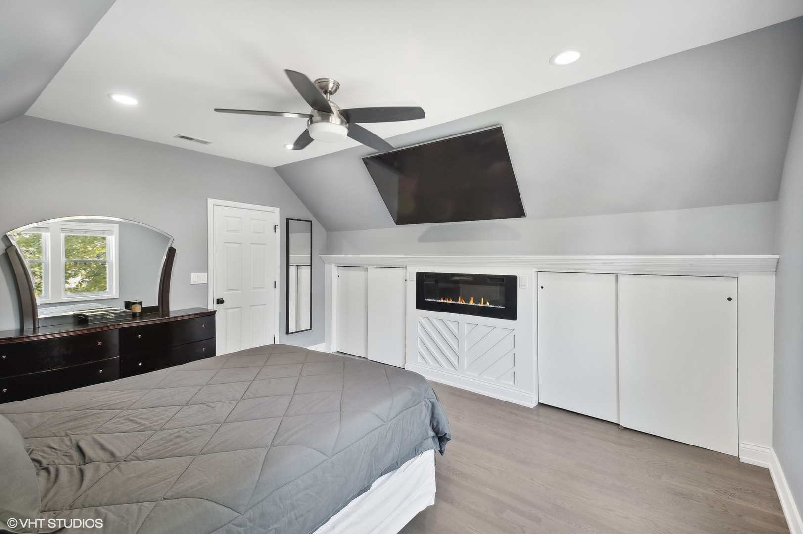 2949 North Rutherford Avenue Chicago, IL 60634 - Photo 9 of 23 a large white bed in a white room with closet