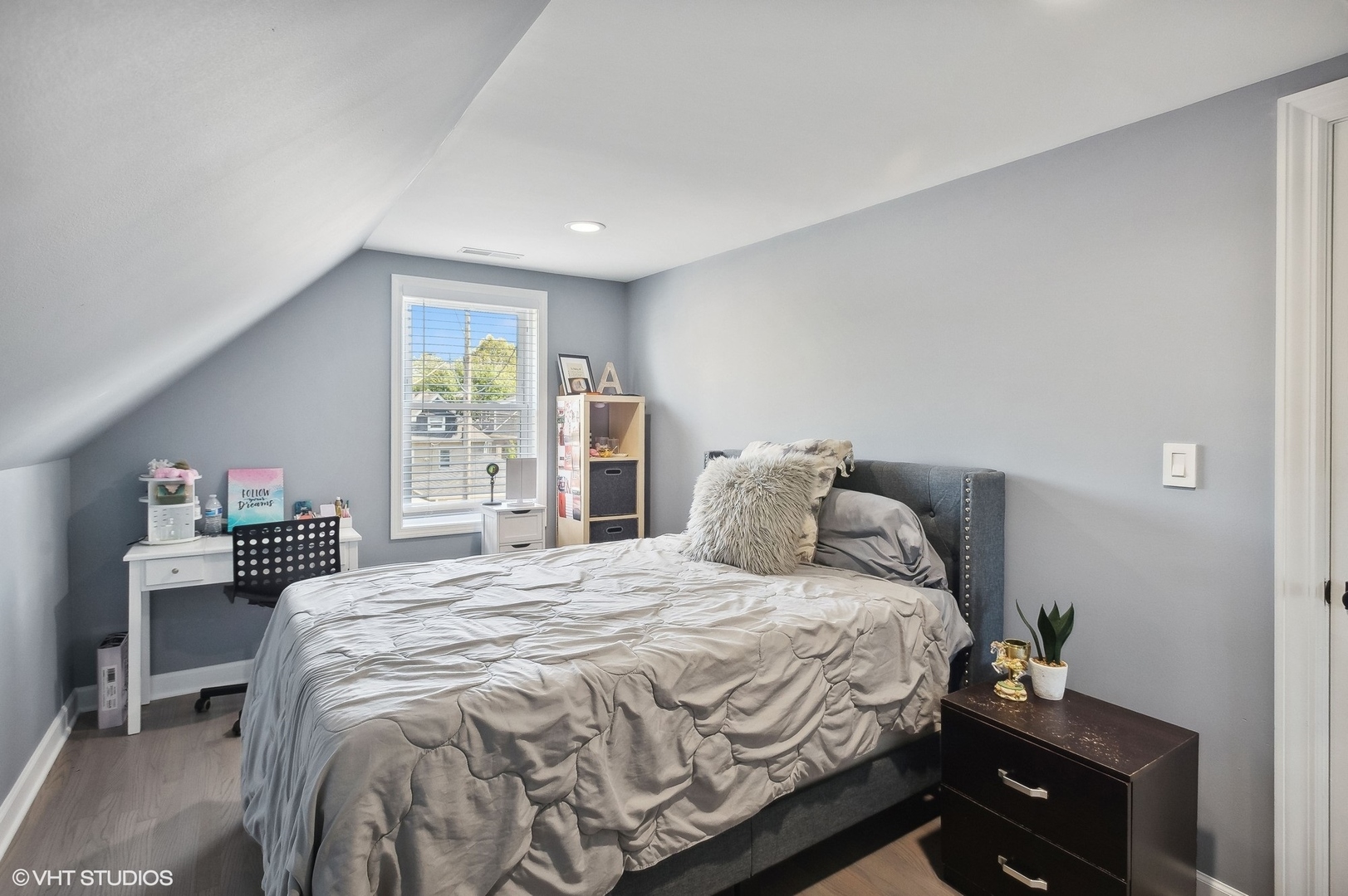 2949 North Rutherford Avenue Chicago, IL 60634 - Photo 10 of 23 a bedroom with a bed and a window