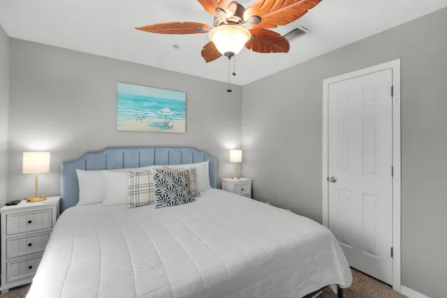 a bedroom with furniture and white walls